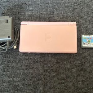 Nintendo DS with charger and game